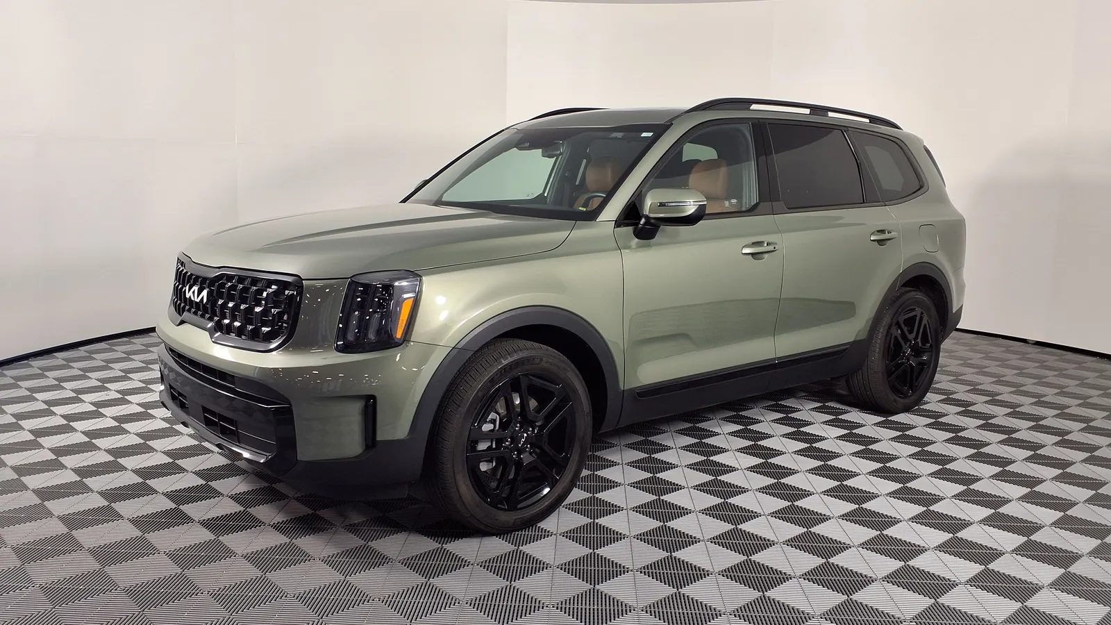 Sage green 2024 Kia Telluride X-Line, front three-quarter view